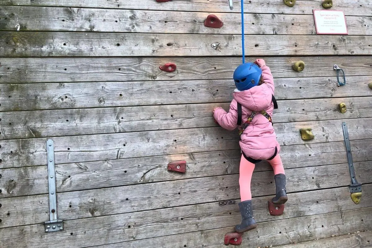 Climbing wall with child climber